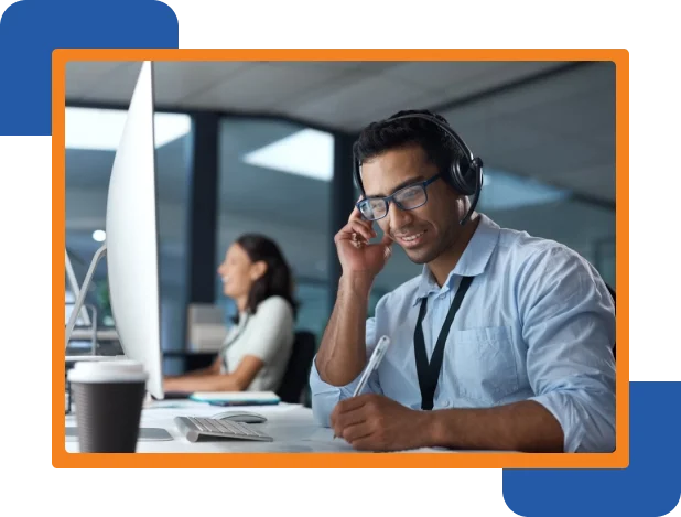 A busy call center, featuring employees assisting customers through phone calls, highlighting outsourcing services