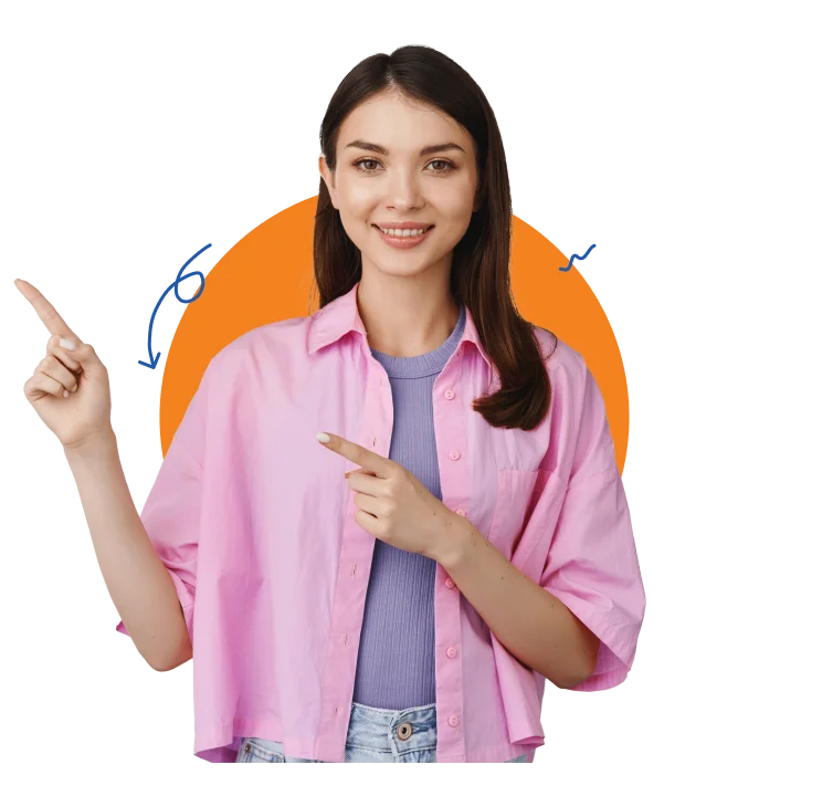 A woman wearing a pink shirt gestures with her finger, pointing at something of significance in her surroundings